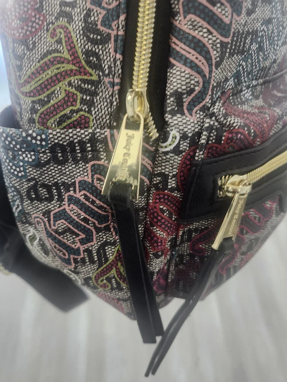 Juicy Couture main multi extrior